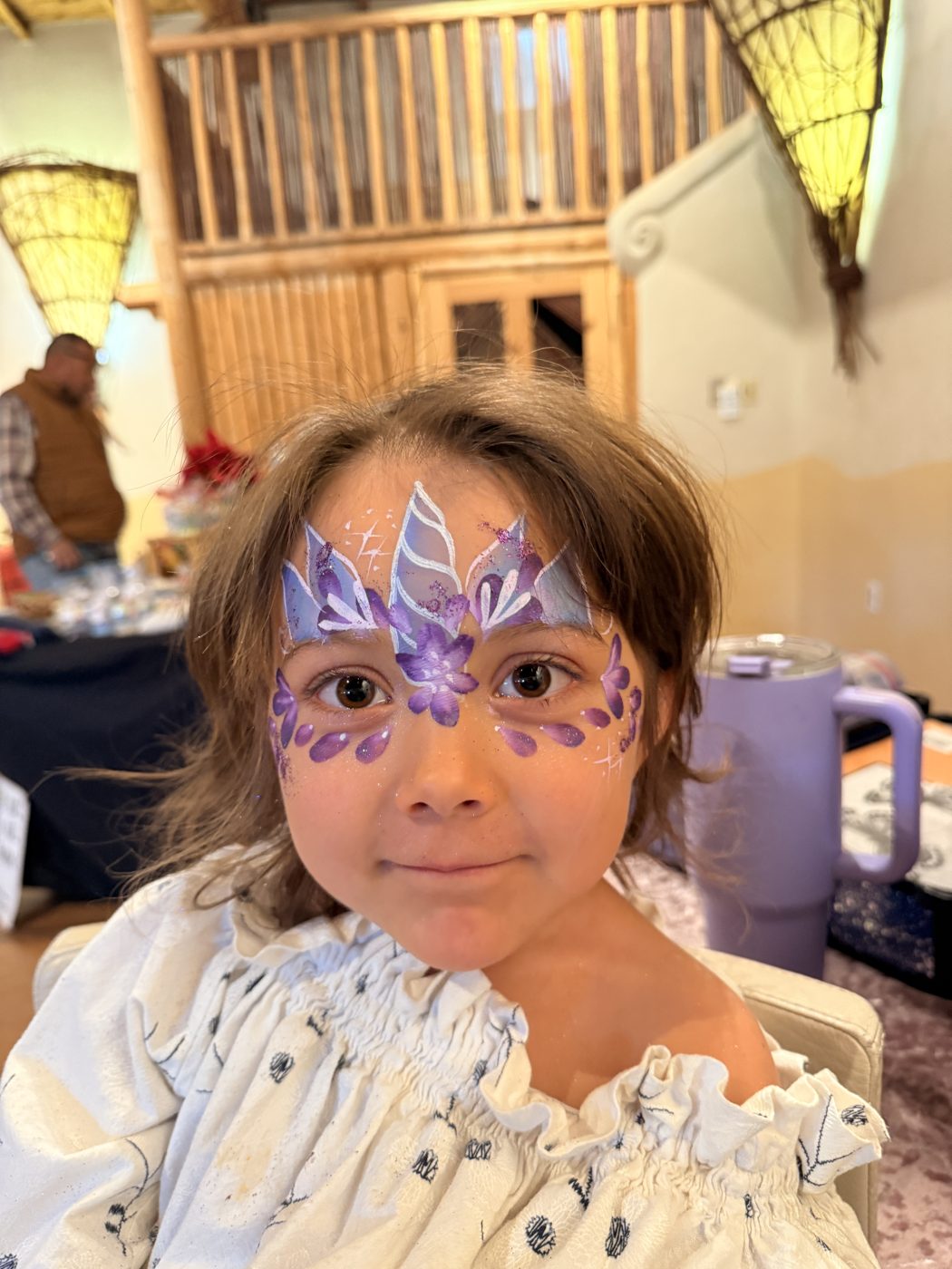 Purple unicorn princess face paint