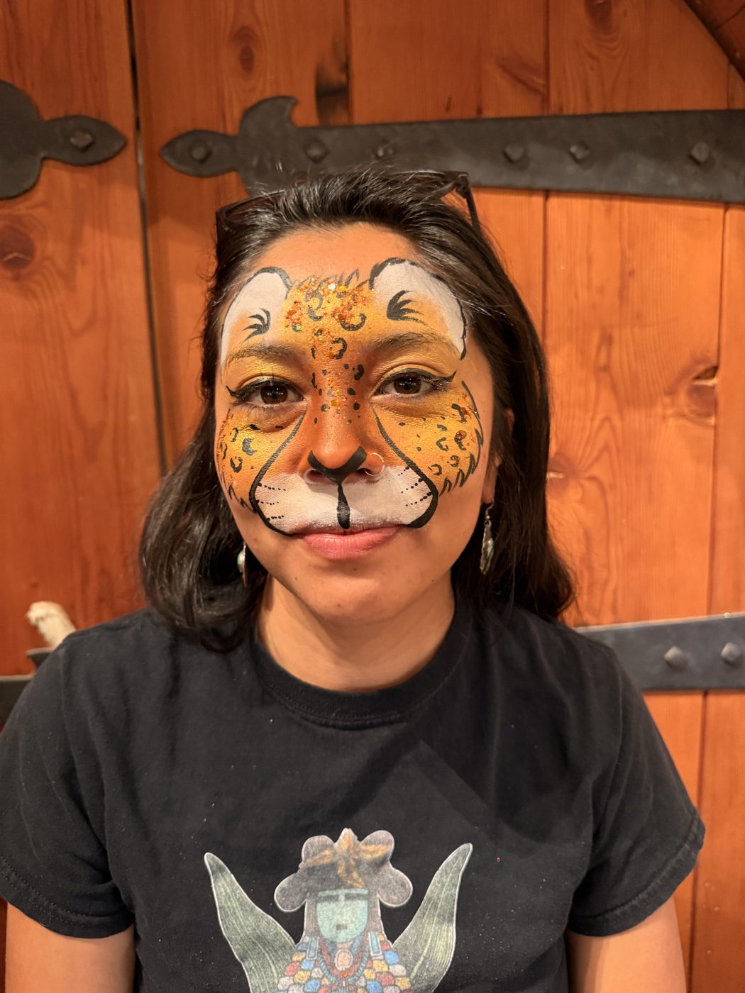 Golden cheetah face paint with glitter