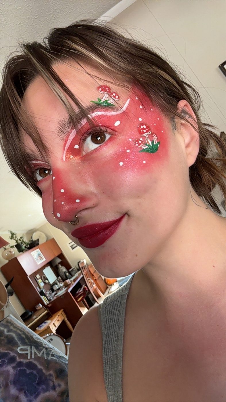 Strawberry fairy face paint with mushrooms